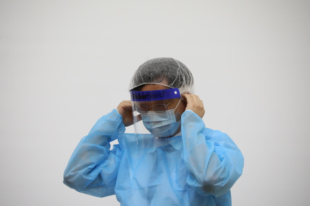 戴頭套（大文新聞網記者李斯哲攝）